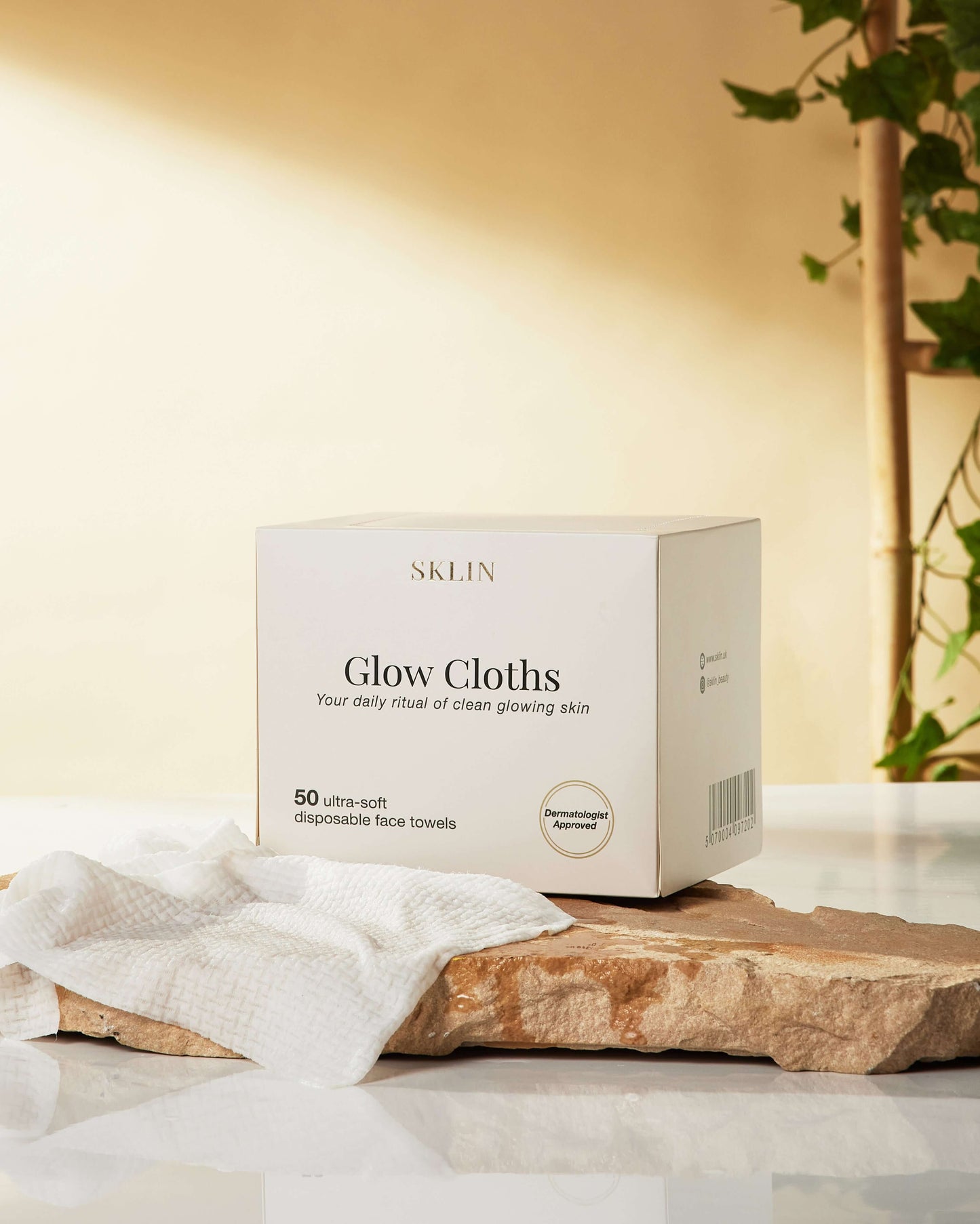 SKLIN Glow Cloths on stone with a cloth